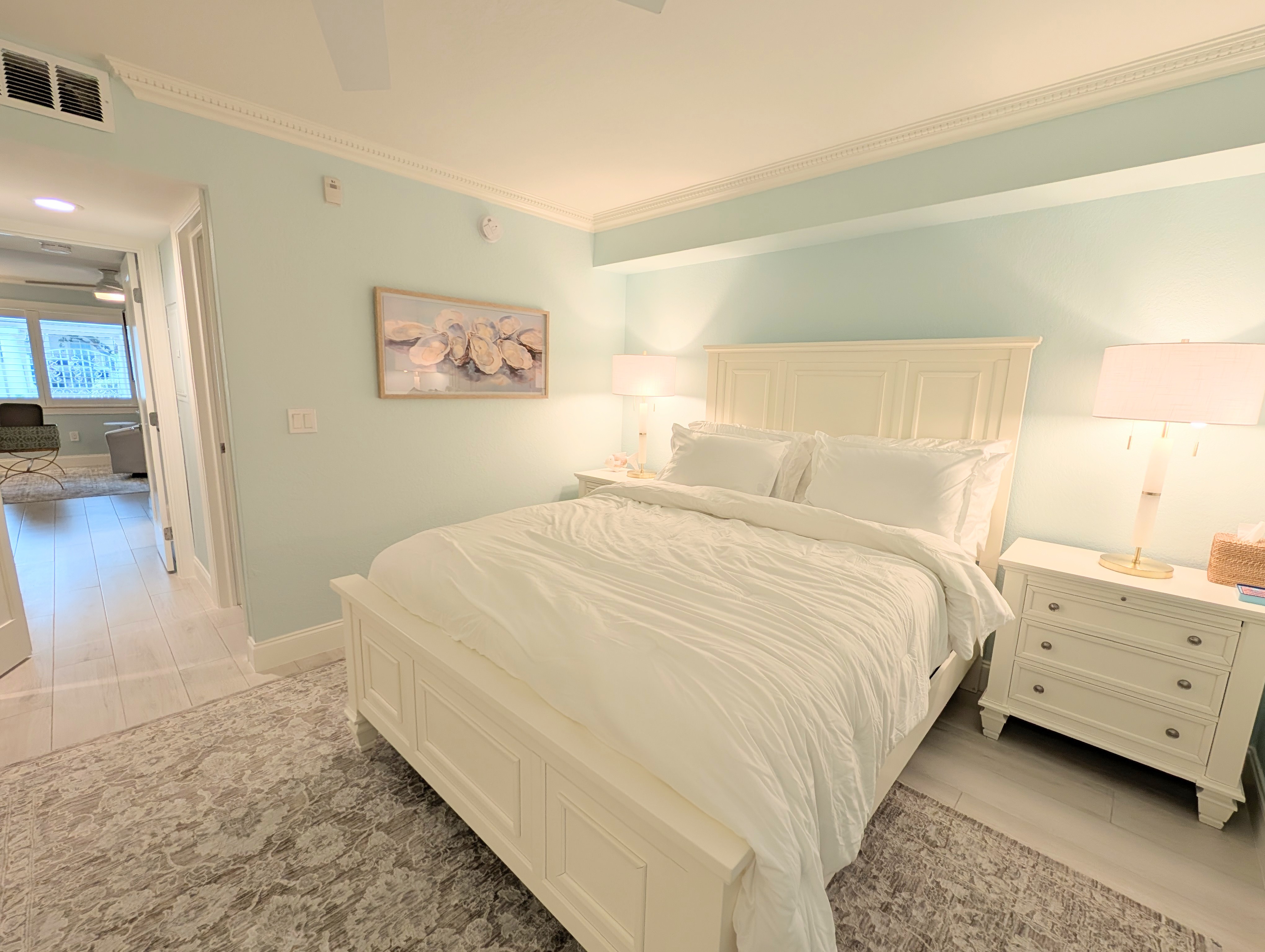 Spacious bedroom with queen-size bed in Old Naples Nook
