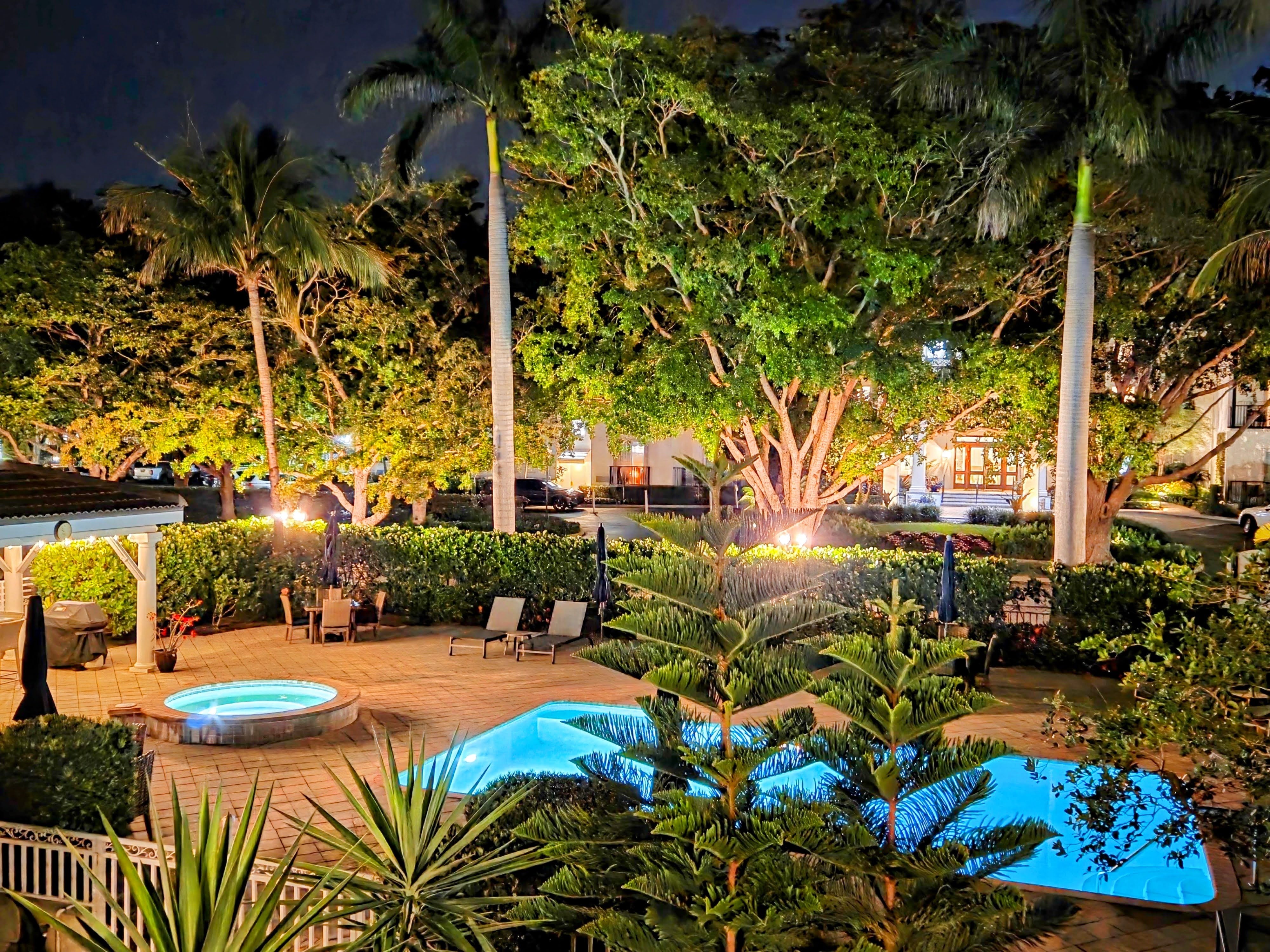 Outdoor pool and patio area at Old Naples Nook